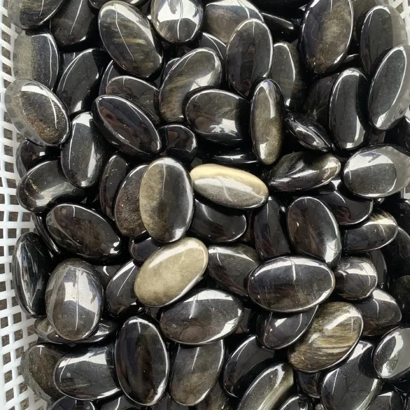Natural Golden Obsidian Palm Stone - Image 2